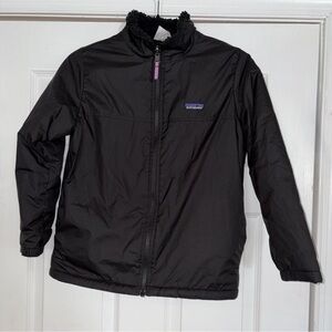 Patagonia Black Shell Jacket with fleece lining kid size medium- 10